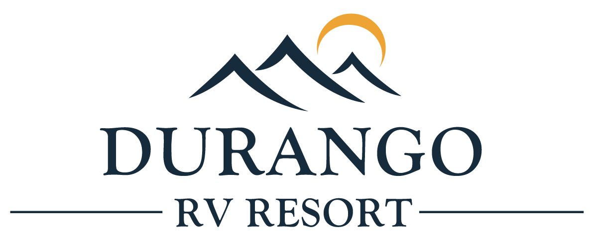 Logo for Oasis Durango RV Resort featuring three stylized mountain peaks and a partial orange sun above the text "DURANGO RV RESORT" in bold, uppercase letters.